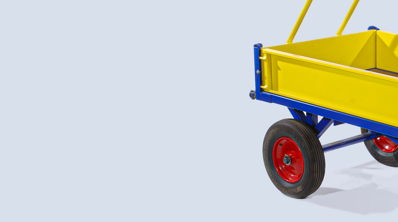 A Bluetrolley heavy-duty platform trailer truck with a bright yellow container, blue frame, and red wheels, designed for functionality and style in outdoor settings, presented on a light blue background.